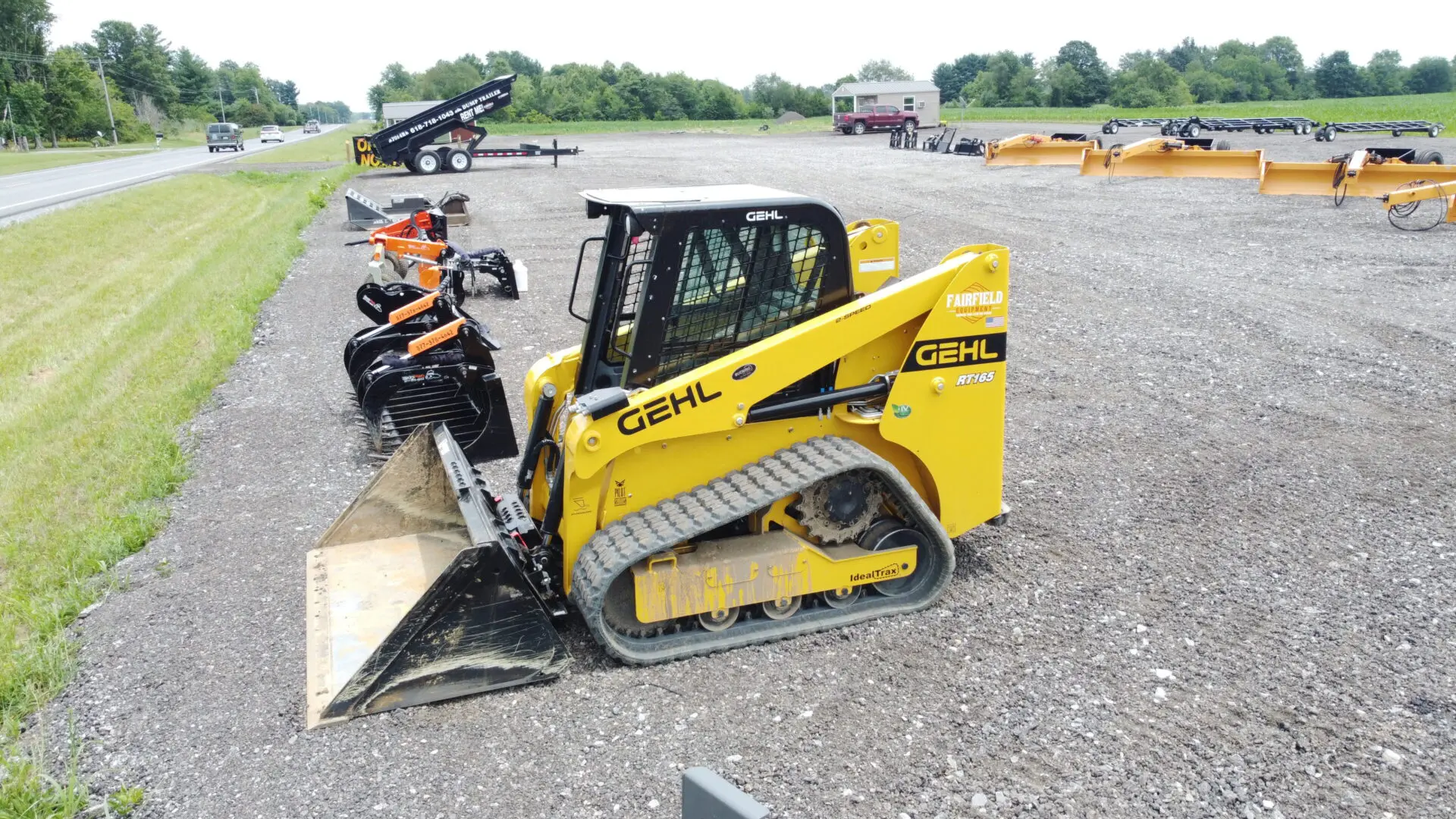 Yellow Gehl RT165 skid steer loader.