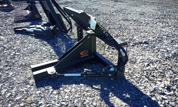 Black quick attach skid steer grapple.