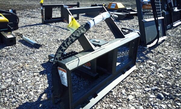 Black metal skid steer attachment.