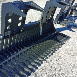 Black metal grapple attachment for a skid steer.