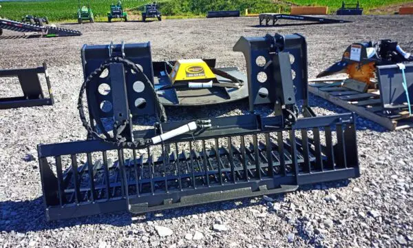 Black metal grapple attachment for tractor.