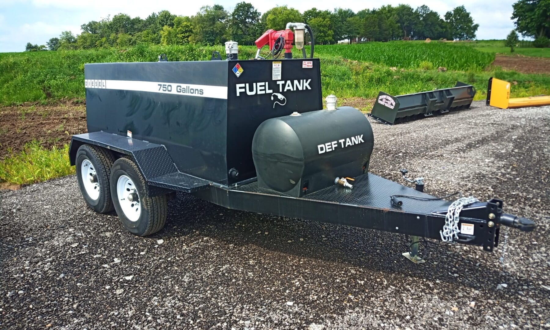 Black fuel and DEF tank trailer.