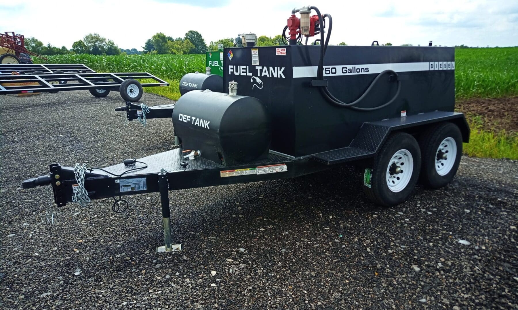 Black fuel tank trailer with wheels.