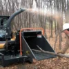 Wood chipper machine in action.