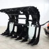 Black grapple bucket for skid steer.
