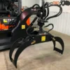 Skid steer grapple attachment.