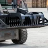 Here's an alt tag for the image: `Heavy-duty grapple attachment for skid steer`