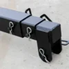 Here's an alt tag for the image: Black metal trailer hitch receiver.