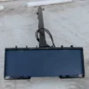 Here's an alt tag for the image: Black metal skid steer attachment.